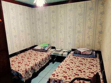 Номер эконом с 2 односпальными кроватями в Гостинице Север